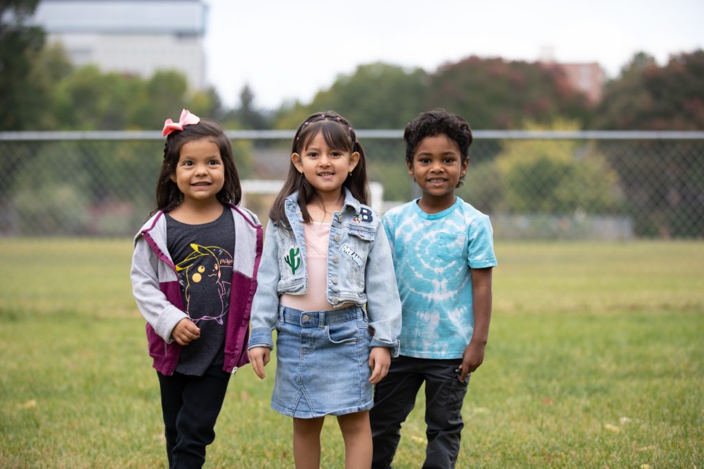 ECE Students standing on playground